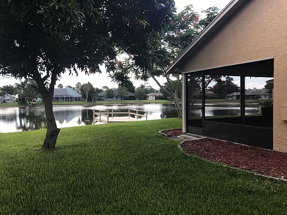 Views of Backyard, Patio, and Lake