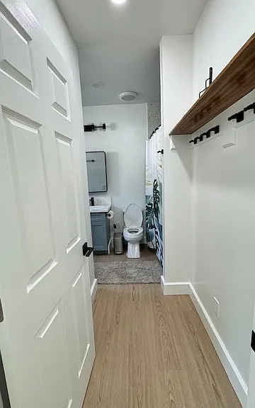 Primary bathroom entrance storage area