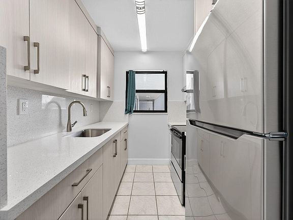 5th image of 1335 W 68th St APT 208
