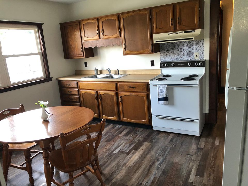Large eat-in kitchen with stove and refrigerator