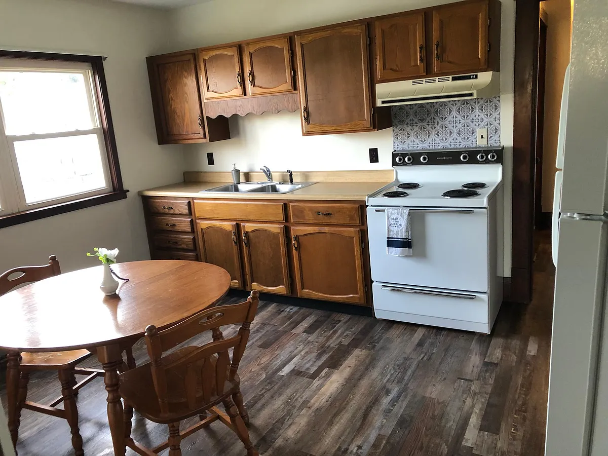 Large eat-in kitchen with stove and refrigerator - 1803 Marshall St #1801