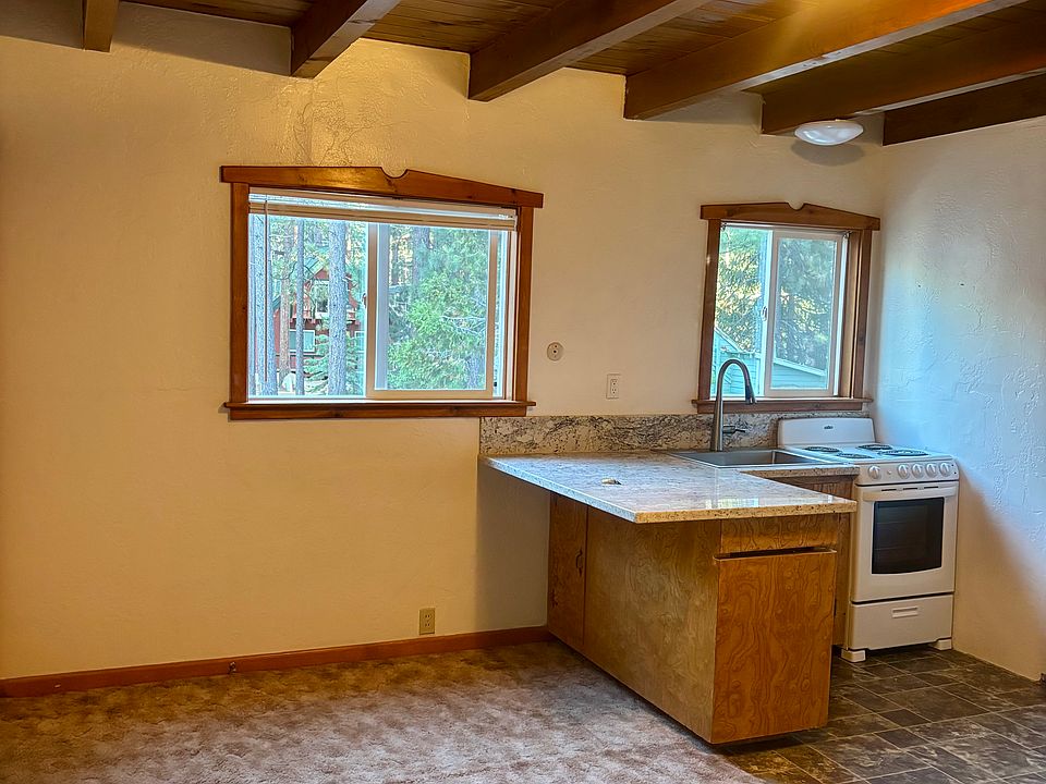Nice large living area with new tiled kitchen flooring