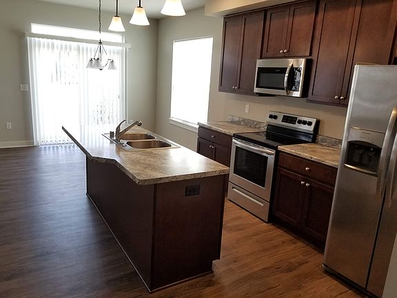 Kitchen with island and dinette