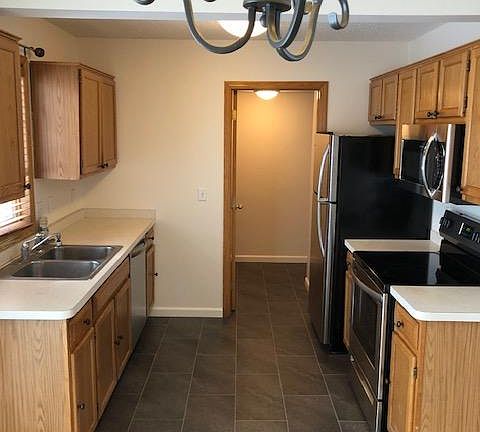 New stainless steel appliances have never been used.