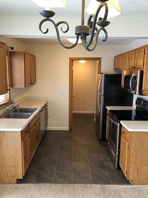 New stainless steel appliances have never been used.