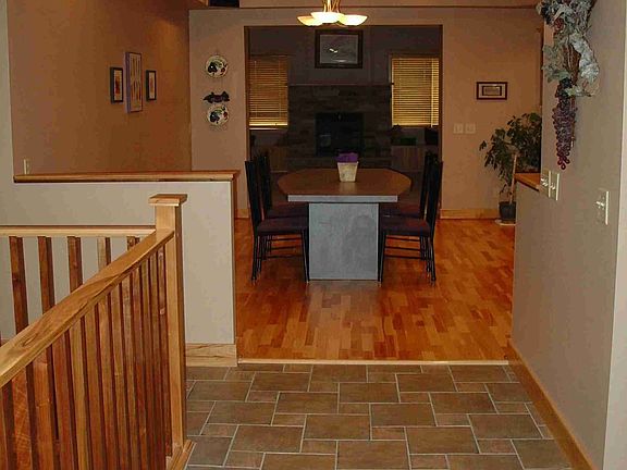 Breathtaking foyer w/ ceramic tile.  Welcoming view of dining & great room.