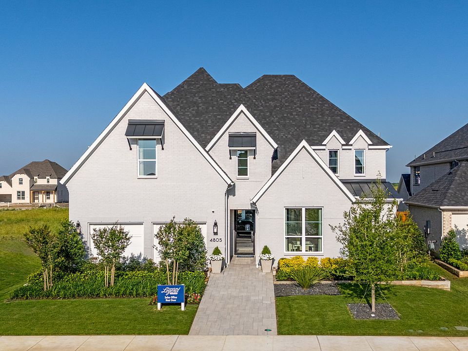 Plan 1640 Front Elevation - Mosaic 60s Model - Photo by American Legend Homes