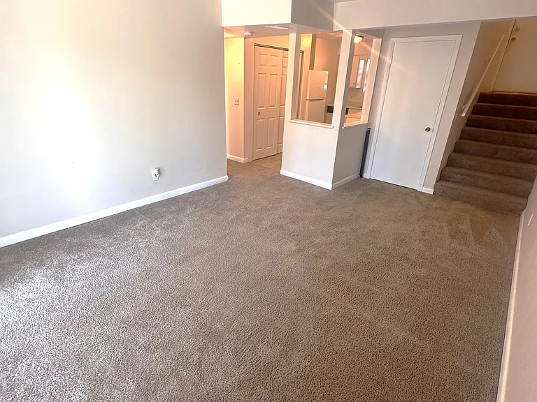 Living Room Opens to Kitchen area