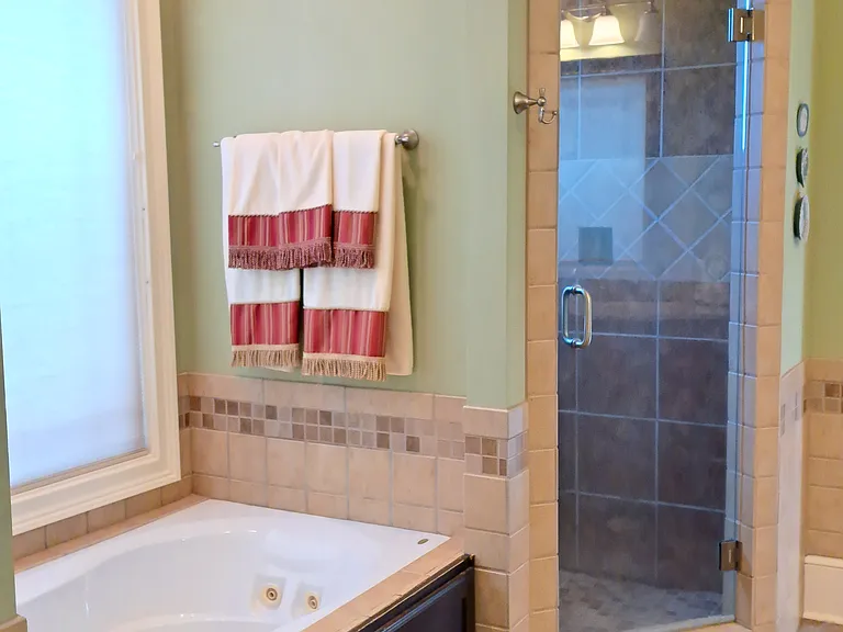 Jacuzzi tub in master bath; shower to right