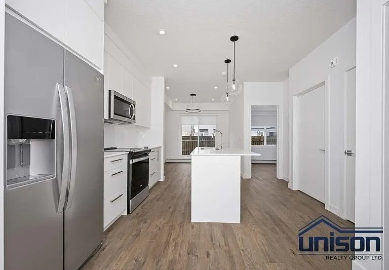 265 Wolf Willow Blvd SE #2117 — Photo 1