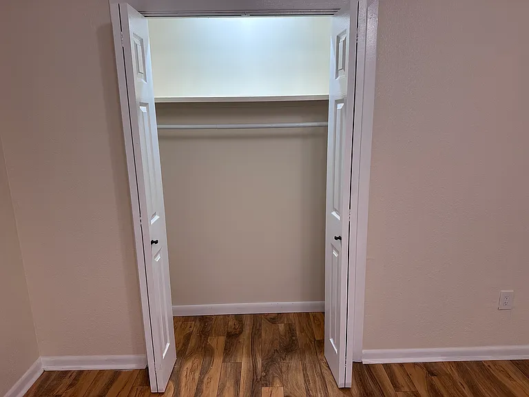 First room off of entryway hall closet
