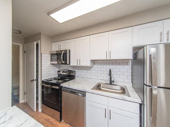 Stainless steel appliances with a built in microwave