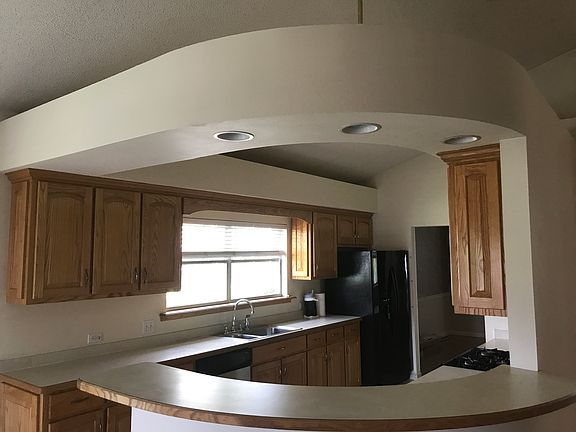 Large kitchen with high counters