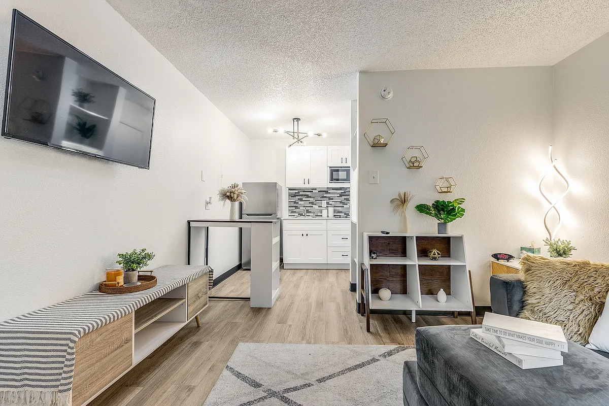 An easy, open layout that brings your living, dining, and kitchen space together seamlessly. - Fusion at the Rye 3030