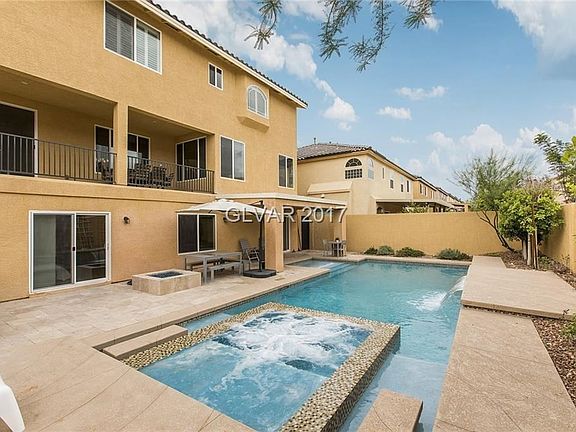 Resort Style Backyard with Pool/Spa, Covered Patio and BBQ Area. Balcony has custom built stairs for access to Backyard from 2nd