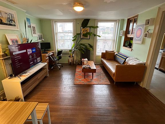 recent tenant living room, 
On right, pass thru and door to kitchen