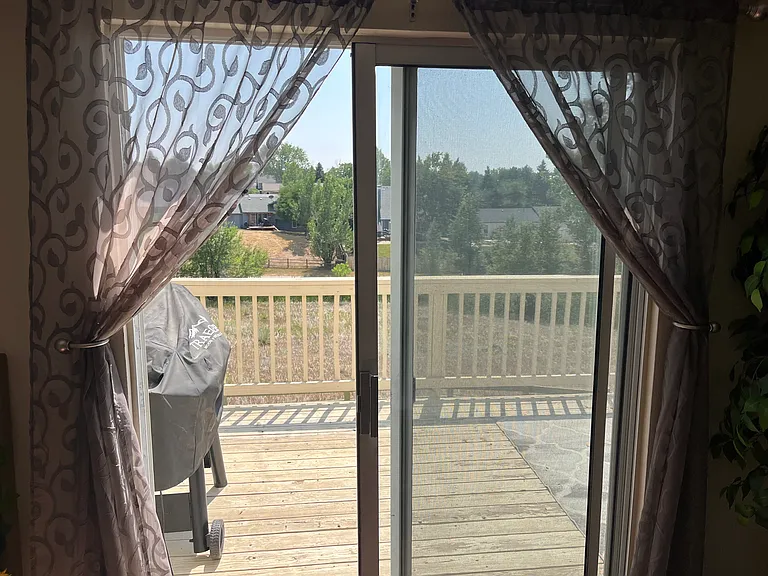 Wood deck on the back is perfect to watch sunsets or observe wildlife near the river