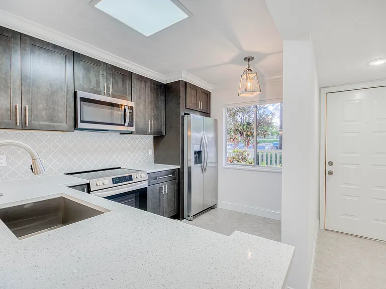 6865 Huntington Ln #105 — Photo 4