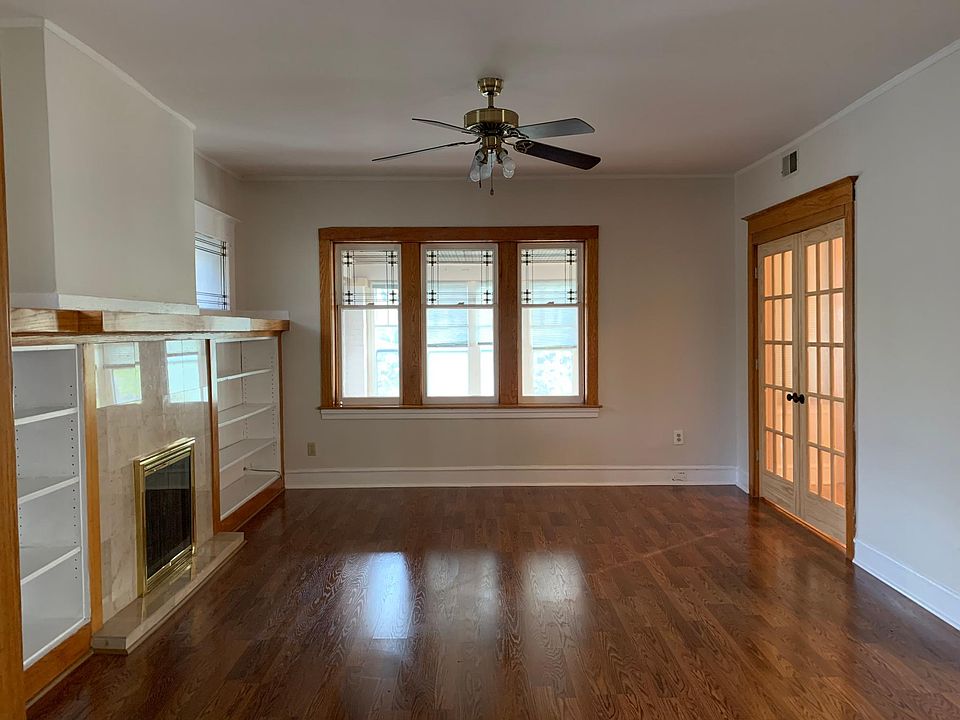 Living room with fireplace, 16' x 13'