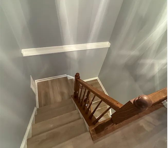 2nd floor stairs leading to first floor