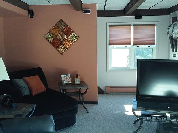 Living room w/beamed ceiling