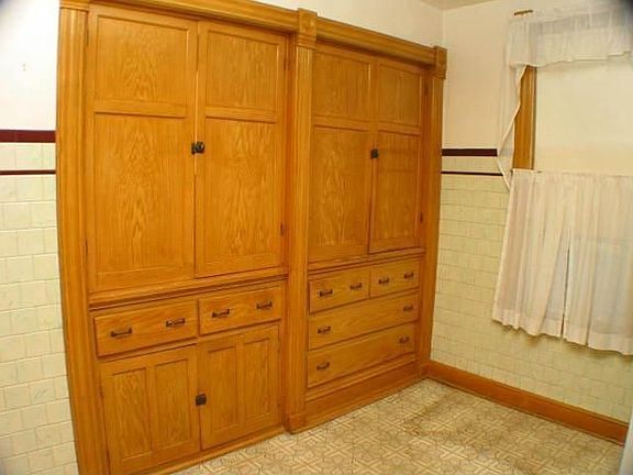 Large wood storage pantry in kitchen