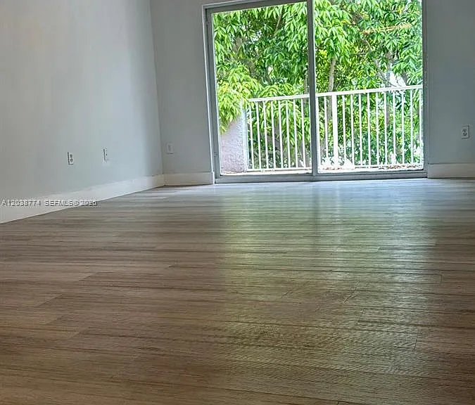 11155 SW 5th Pl #302 — Photo 1