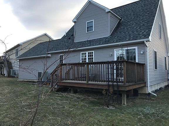 Rear deck next to the park and walking path
