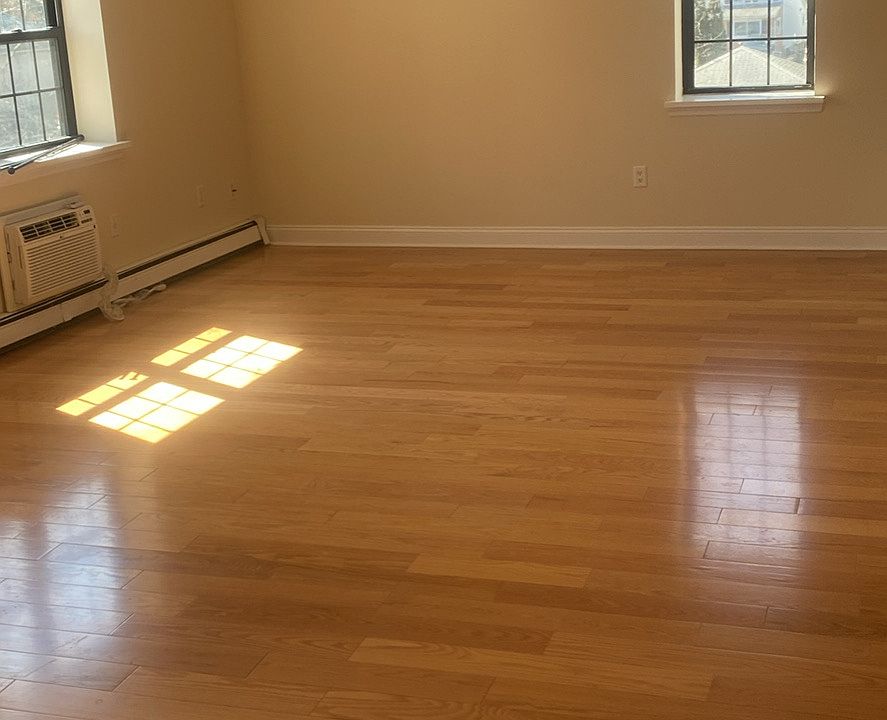 Large Living room and dining area with hardwood floors throughout.