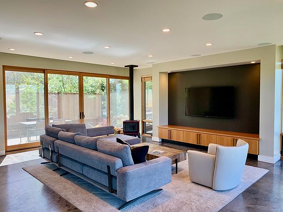 Open living space, TV, wood burning firebox, views galore.