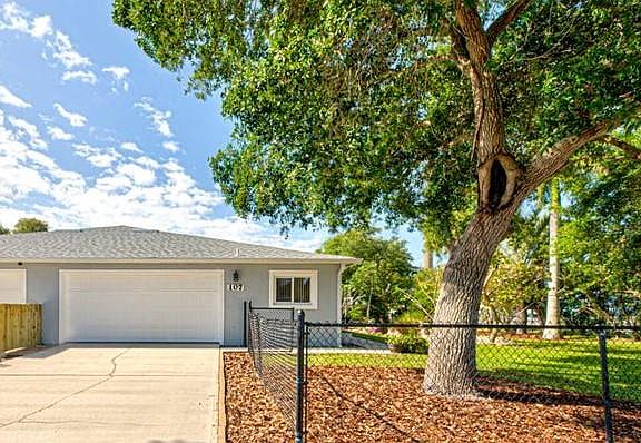Duplex with Fenced Yard and 2 Car Garage