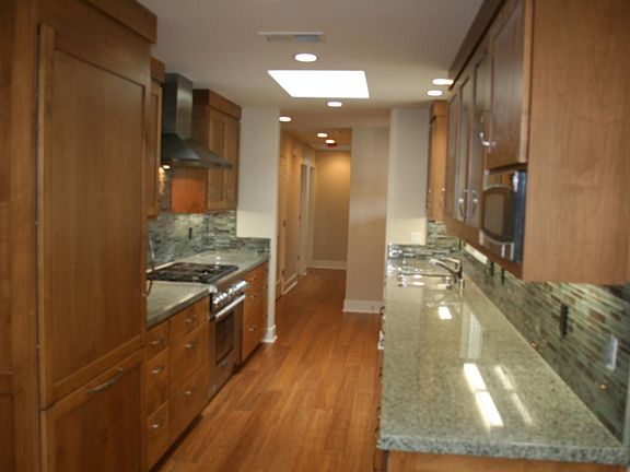 All new kitchen in 2014. High end appliances. Gas and electric Thermadore range. Granite countertops. Lot's of natural light with skylights in the kitchen and hallways.