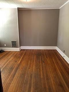 living room with original hardwood floors