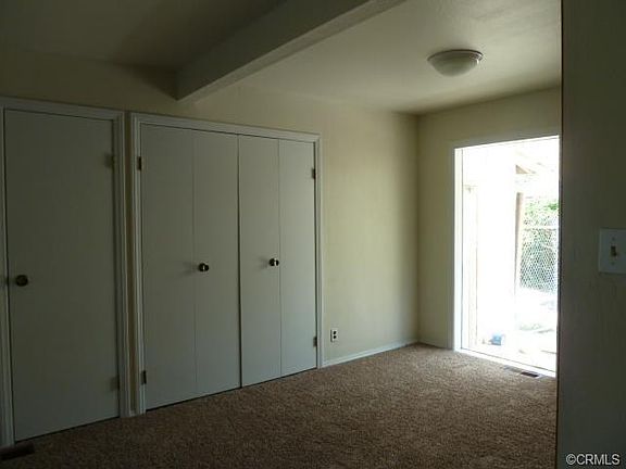 Eating area and laundry behind doors