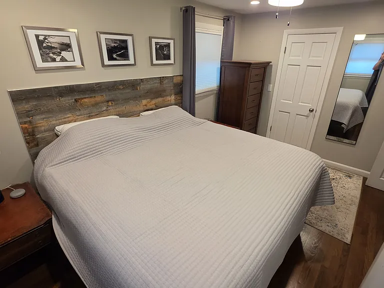 Master Bedroom with king bed, mini split and ensuite bathroom/shower.