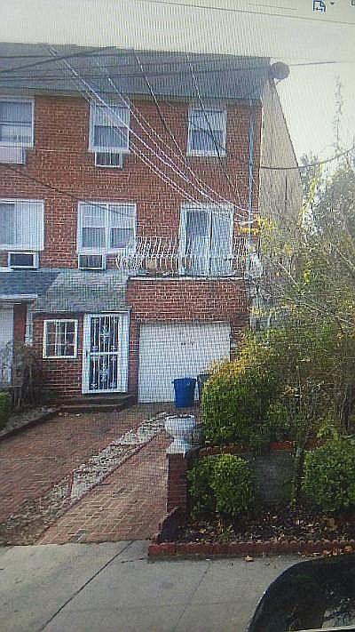 Front view-garage & driveway