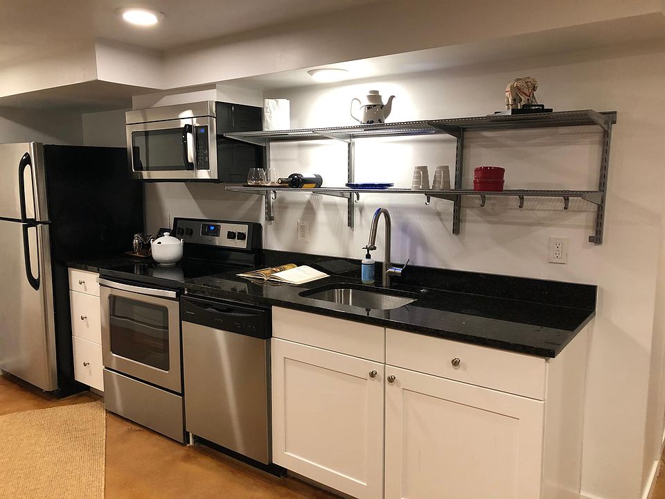 Kitchen with full-size, stainless steel appliances