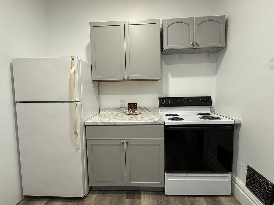 Kitchen fridge to stove.