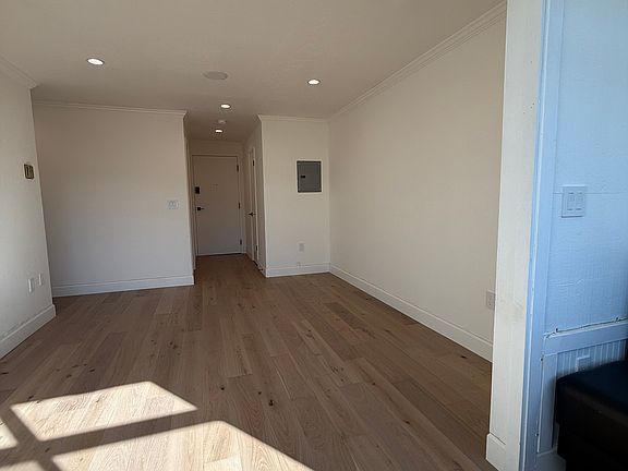 Entry, in ceiling speakers in living area