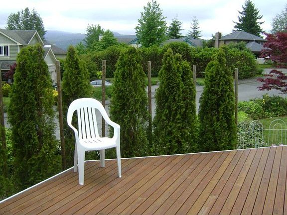 Deck out from front door toward lake and mountains beyond