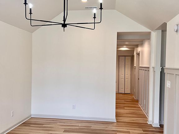 From the living room you'll have access to 2 guest bedrooms on your right and the kitchen and master bedroom on the other side of the wall.