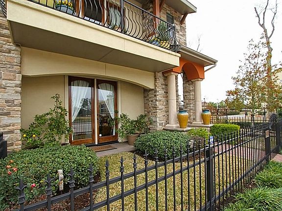 This Corner location offers a nice front green space. The rear entry garage has a separate HVAC system, finished out and insulated, with surround sound.