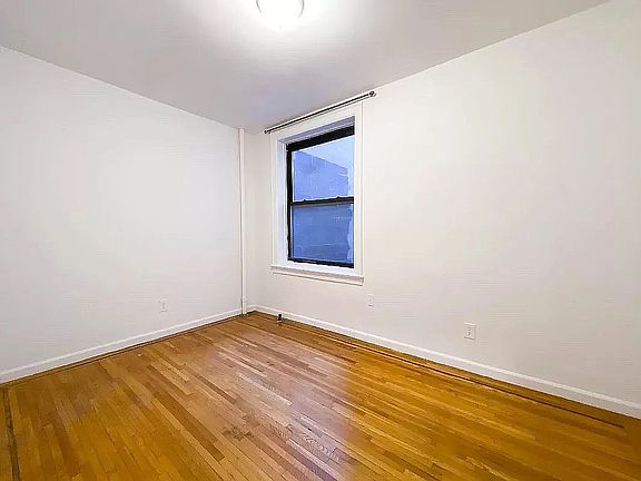 4th image of 210 E 10th St APT 1