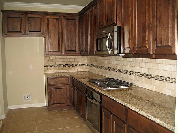 Sample photo- actual finishes may vary. With all these cabinets, you'll never have to worry about ha