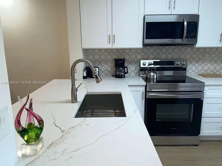 7350 Kinghurst Dr #305 — Photo 3