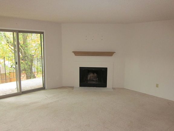 Spacious Living Room w/ Cozy Fireplace