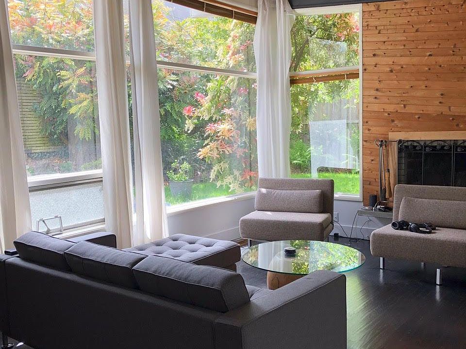 Living room with view to backyard.
