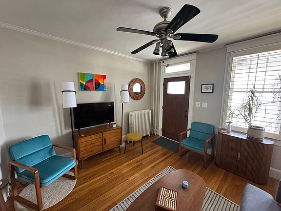 A new front door with an opaque window lets light in while maintaining complete privacy.