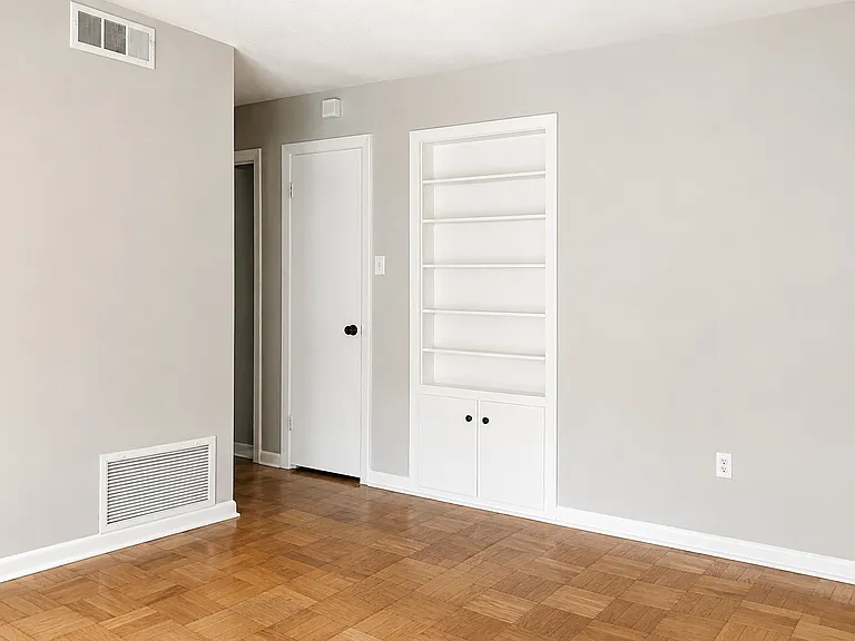 Hall Closet and Built In Bookshelf