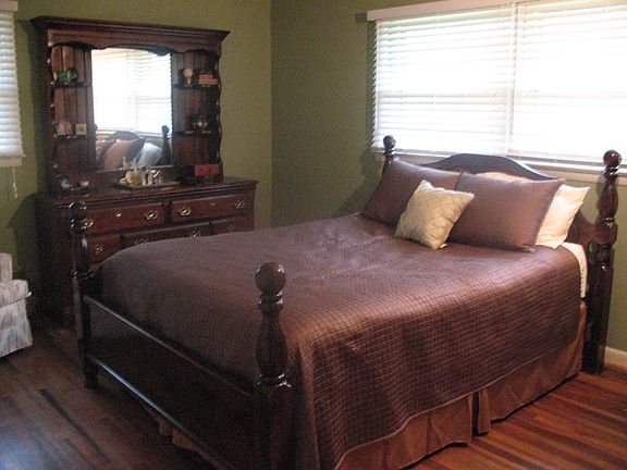 Spacious Master Bedroom. Note the beautiful original hardwood floors. 